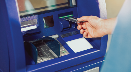 person using an ATM