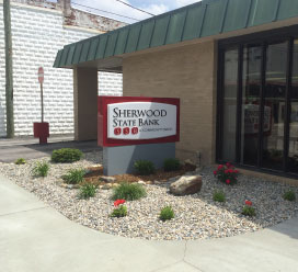 Sherwood State Bank Building on a sunny day